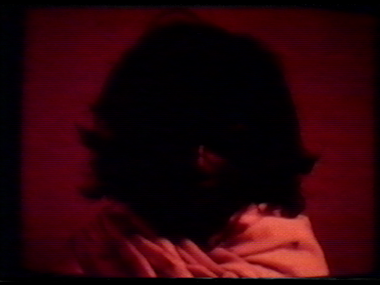 Column 3. A pair of video stills featuring an old woman symbolising Refugee.